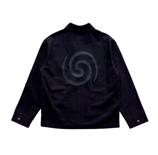 Back view of the Hypnotic Clothing Lucien black work jacket flat lay, modern streetwear design showing rear details.