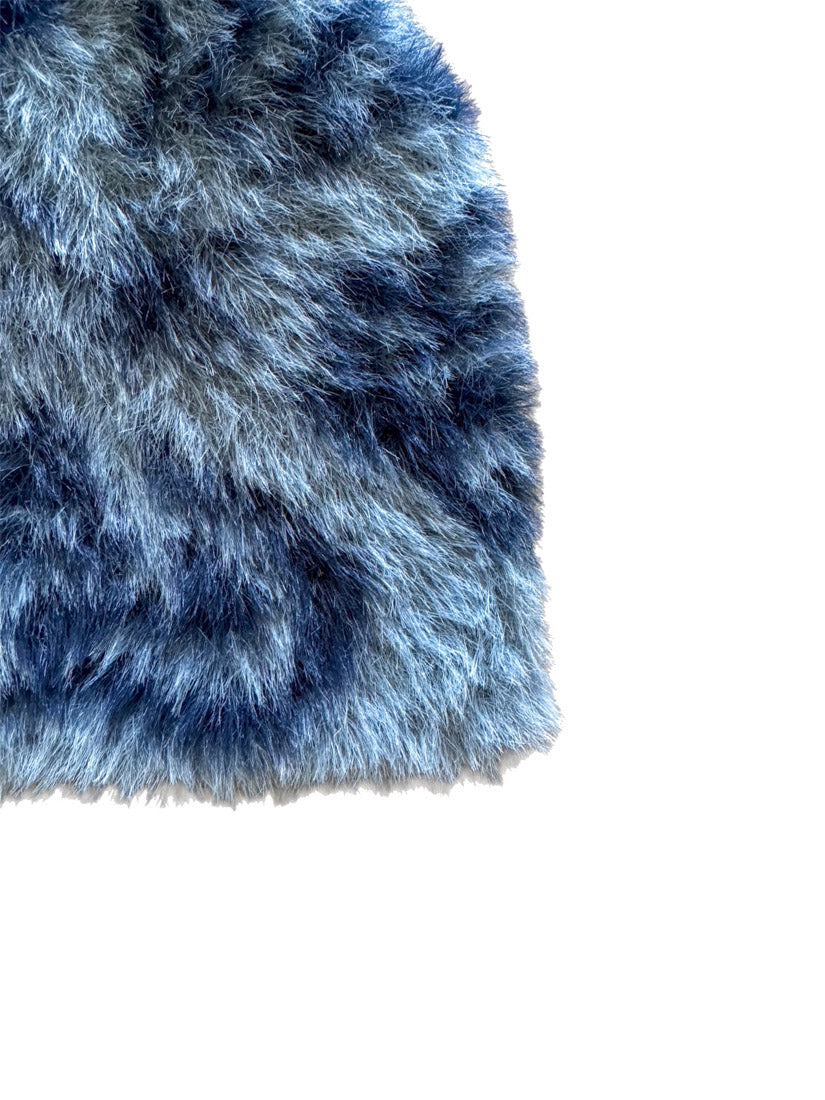 Close-up detail of the Hypnotic Clothing Magnate blue mohair knit beanie showing fuzzy texture and pattern.