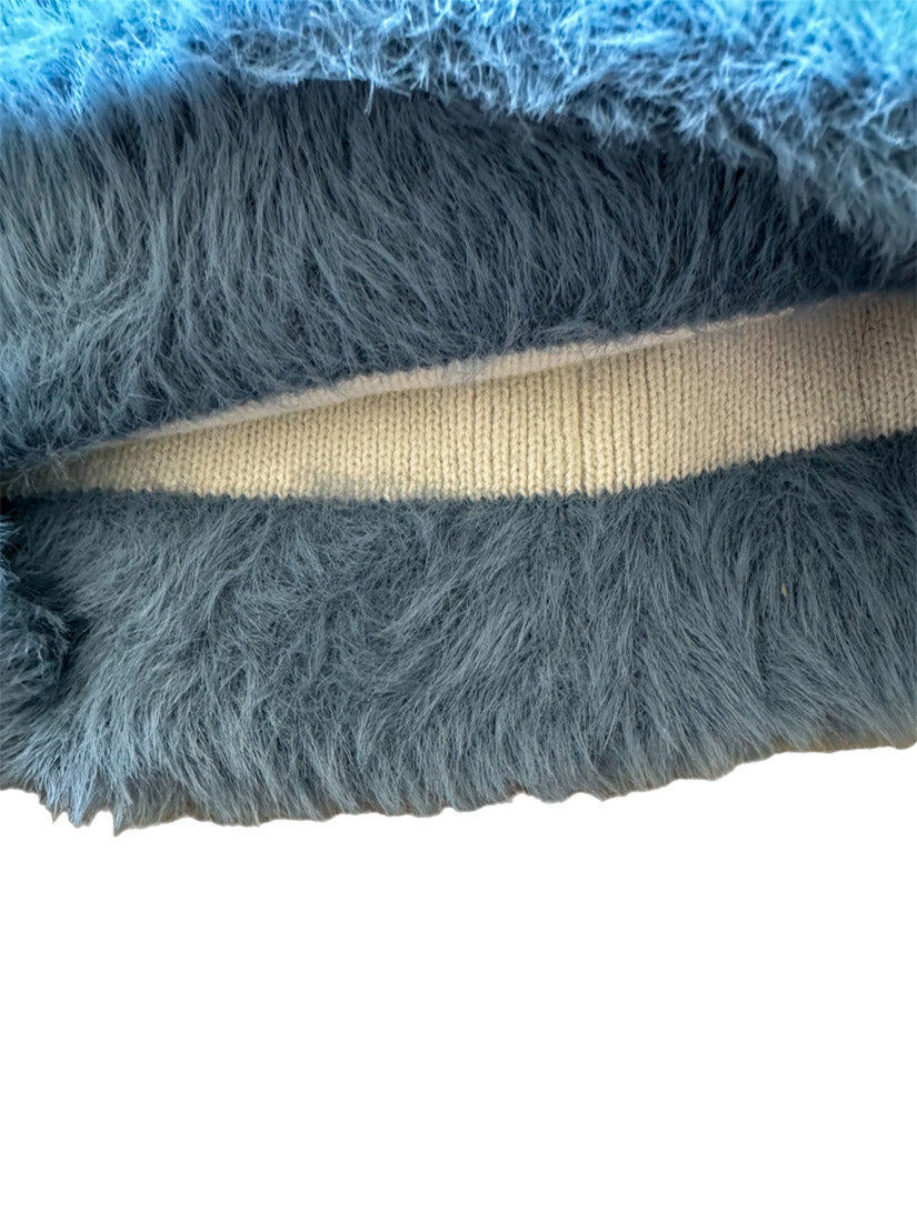 Inside view of the Hypnotic Clothing Magnate mohair knit beanie showing soft interior lining and construction details.