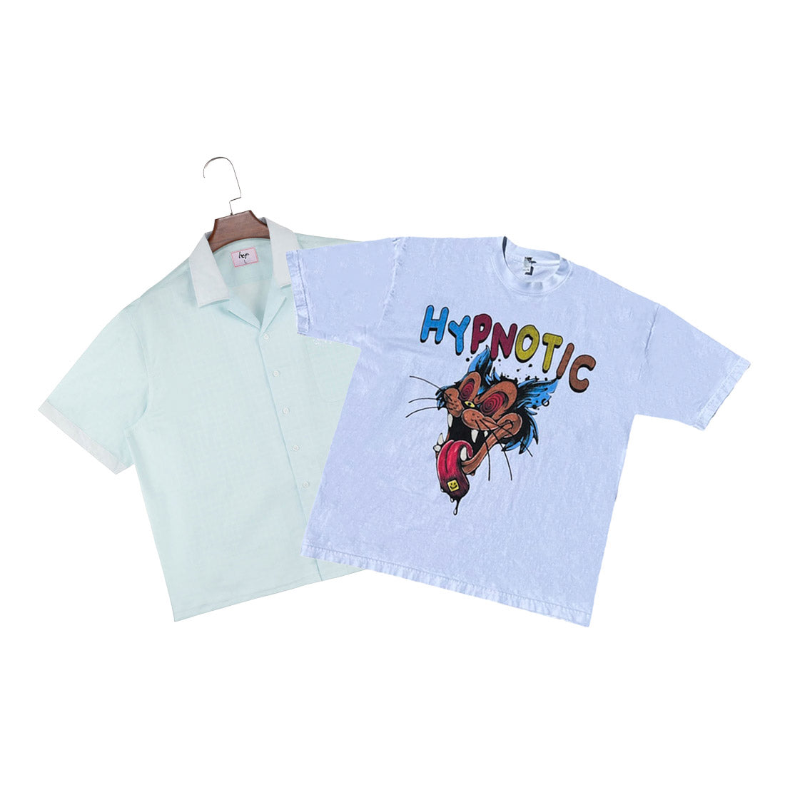 Hypnotic Clothing "Take a Trip" graphic tee and "hyp" button-up shirt laid flat side-by-side on white background.